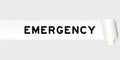 Rip gray paper background that have word emergency under torn part Royalty Free Stock Photo