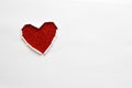 Ripped paper hole heart shaped on white paper background. Valentine`s day celebration concept Royalty Free Stock Photo