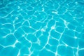 Ripple blue water in swimming pool witn sun reflection Royalty Free Stock Photo