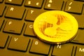 Ripple coin on computer keyboard Royalty Free Stock Photo