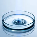 Ripple Effect in a Scientific Petri Dish Royalty Free Stock Photo