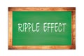 RIPPLE  EFFECT text written on green school board Royalty Free Stock Photo