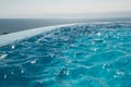 Ripple Water in infinity swimming pool. Paradise resort concept. Seaview. Royalty Free Stock Photo