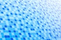 Ripple Water in swimming pool with blue tile floor background Royalty Free Stock Photo