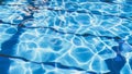 Ripple Water in swimming pool with sun reflection. Summer day at swimming pool. Background and texture concept. Royalty Free Stock Photo