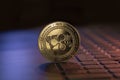 Ripple XRP crypto coin placed on keyboard in dark background Royalty Free Stock Photo