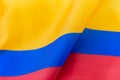 Ripple yellow, blue and red fabric of Colombia flag Royalty Free Stock Photo