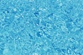 Rippled pattern of clean water in a blue swimming pool Royalty Free Stock Photo