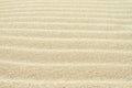 Rippled sand on the sea coast formed by wind and water, background Royalty Free Stock Photo