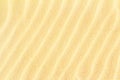 Rippled sand on the sea coast formed by wind and water, background Royalty Free Stock Photo