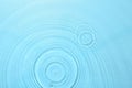Rippled surface of clear water on light blue background, top view Royalty Free Stock Photo