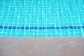 Rippled surface of Swimming pool blue water sun reflecting sleek background Royalty Free Stock Photo