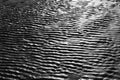 Rippled wet sand patterns Royalty Free Stock Photo