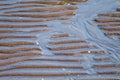 Rippled wet sand and water at the beach texture background Royalty Free Stock Photo