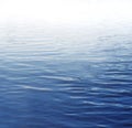 Ripples on blue water surface Royalty Free Stock Photo