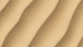 Ripples of fine sand create a textured pattern resembling waves Royalty Free Stock Photo