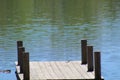 Ripples on the Lake Beyond the Dock Royalty Free Stock Photo