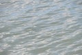 Ripples in light blue water background Royalty Free Stock Photo