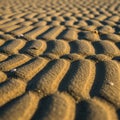 Ripples of sand create a textured pattern likely formed by wind or water Royalty Free Stock Photo