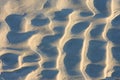 Ripples in the sand left by waves on a beach in England Royalty Free Stock Photo