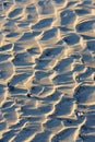 Ripples in the sand left by waves on a beach in England Royalty Free Stock Photo