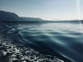 Ripples In The Wake Of A Pontoon Boat At Sunrise On a Lake in Turkey