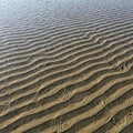 Scene reflects low tide conditions, where water has receded, leaving Royalty Free Stock Photo