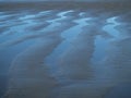 Detail of rippled wet sand on New Brighton beach, New Zealand Royalty Free Stock Photo