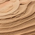 Rippling layers of fine sand create a textured, abstract pattern. The layers are closely stacked, Royalty Free Stock Photo