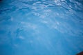 Rippling water in a pool. Bright blue water background