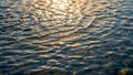 Waves display a pattern of intersecting lines with the sunlight Royalty Free Stock Photo