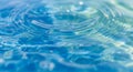 Rippling water surface in shades of blue and turquoise, capturing gentle waves and Royalty Free Stock Photo