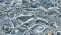 Rippling water surface with sunlight reflecting and creating abstract patterns of light and shadow Royalty Free Stock Photo