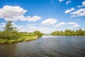 Rippling water surface in a wide Dutch creek Royalty Free Stock Photo