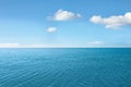 Ripply sea under blue sky with clouds Royalty Free Stock Photo