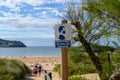 Ris Beach. Cantabria, Spain. July 13, 2021. Sign with drawing of head with face mask and inscription in Spanish that says Royalty Free Stock Photo