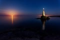 The rise of the full moon over the Lighthouse, Bulgaria Royalty Free Stock Photo