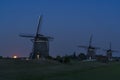 The rise of the Supermoon next to these old windmills in Stompwijk Molendriegang Stompwijk, the Netherlands