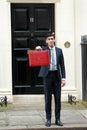 Rishi Sunak, Chancellor of the Exchequer, leaves No.11 Downing Street to present his budget at the H Royalty Free Stock Photo