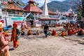 Rishikesh, India - 29.03.2023: Hindu pilgrims near a temple in Rishikesh, Uttarakhand.