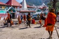 Rishikesh, India - 29.03.2023: Hindu pilgrims near a temple in Rishikesh, Uttarakhand.