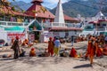 Rishikesh, India - 29.03.2023: Hindu pilgrims near a temple in Rishikesh, Uttarakhand.