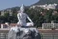 Statue of Shiva, Hindu idol near Ganges River water, Rishikesh, India. The first Hindu God Shiva. Sacred places for pilgrims Royalty Free Stock Photo