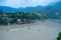 Rishikesh in India very beautiful scenery with boat in the river ganges in Rishikesh lake in the mountains of Himalayas exotic tou