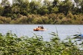 RISHON LE ZION, ISRAEL -APRIL 14, 2018: People ride on pedal boats or paddle boats at the lake in Rishon Le Zion, Israel Royalty Free Stock Photo