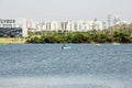 RISHON LE ZION, ISRAEL -APRIL 14, 2018: People ride on pedal boats or paddle boats at the lake in Rishon Le Zion, Israel Royalty Free Stock Photo