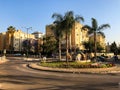 RISHON LE ZION, ISRAEL -APRIL 23, 2018: Roundabout with small fountain on the street with palms in Rishon Le Zion, Israel.