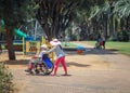 A morning stroll in the city park with invalid tender