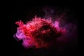 Rising cloud of smoke from red and purple paint pigment explosion. Royalty Free Stock Photo