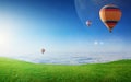 Rising hot air balloons in clear blue sky Royalty Free Stock Photo